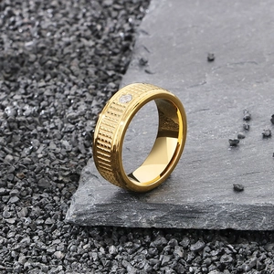 Minimalist gold stainless steel ring with grid texture and cubic zirconia stone inlay