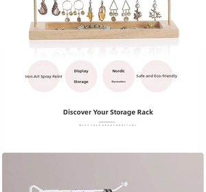 Detail of earring holder with solid wood base and tiered metal jewelry display hooks