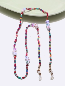 Chaîne de perles colorées avec lettres et fermoirs dorés pour lunettes ou masques