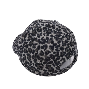 Rear view of a leopard print corduroy baseball cap with an adjustable metal buckle strap