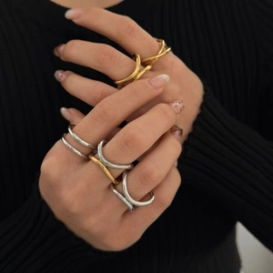 Minimalist geometric crisscross stainless steel rings in gold and silver finish for women