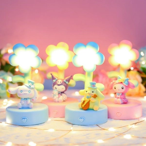 Cozy group display of four Sanrio character flower night lights with soft warm lighting