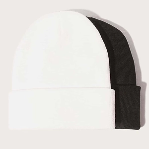 Knit beanie set in black and white colors featuring folded cuffs for men and women