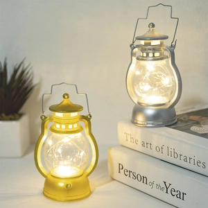 Vintage LED Christmas lantern set in gold and silver finish with warm fairy lights