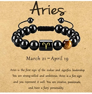 Detail of Aries black agate bracelet with tiger eye stone and adjustable woven cord