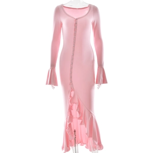 Detail of pink long sleeve dress featuring flare cuffs and a button-down front design