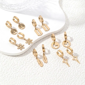 Minimalist gold-plated stainless steel hoop earrings set with butterfly and star charms