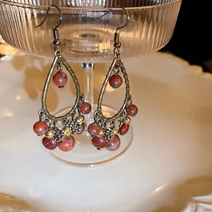 Bohemian retro drop earrings with red mineral beads and vintage bronze alloy frames