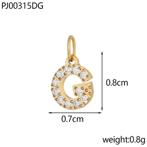 Detail of a 0.8cm golden pendant letter G with micro-paved zircons and measurements