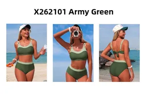 Army green two-piece bikini with adjustable straps and square buckle detail on beach