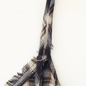 Plaid spaghetti strap maxi dress with fringe edges and metal adjustment buckle detail