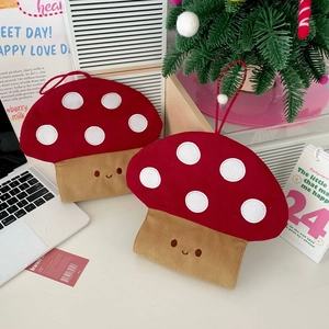 Detail view of mushroom corduroy tissue case with cute embroidery and hanging strap