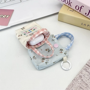 Floral canvas mini earphone case with checkered handle and snap button closure