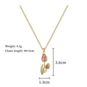 Detail showing dimensions of gold tulip necklace with pink gemstones and sparkle