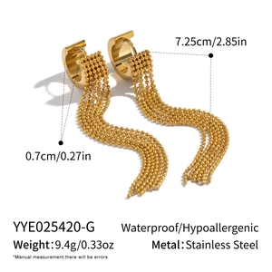 Detail view of gold stainless steel tassel earrings with weight and size specifications