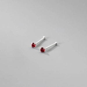 Minimalist 999 sterling silver stud earrings with four-prong round red zircon stone