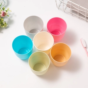 Set of six colorful matte plastic travel cups for bathroom use in various pastel colors