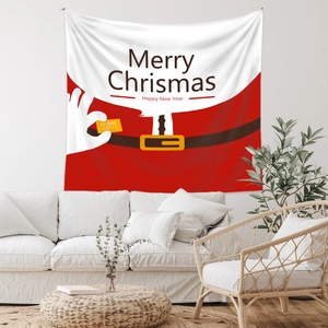Detail of Christmas tapestry featuring Santa suit design on a modern living room wall