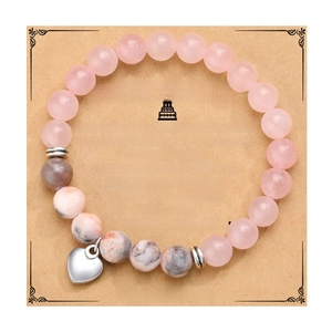 Pink zebra bead friendship bracelet with silver heart pendant on 18th birthday card