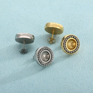 Creative stainless steel round stud earrings set in gold and silver with twisted edge design