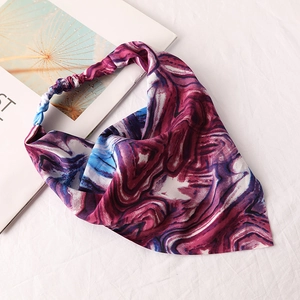 Detail of marble tie-dye pattern on chiffon hair bandana with elastic band for women