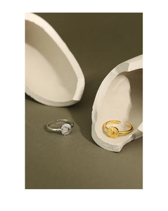 Detailed comparison of gold and silver sun and moon rings with sparkling zircon inlay