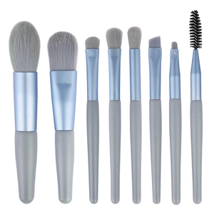 8-piece mini portable makeup brush set with grey-blue wooden handles and soft fiber bristles