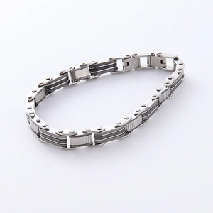 Men's serrated stainless steel chain bracelet with silver and black industrial design