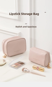 Pink PU leather makeup bag set with gold leaf zipper pull and detailed texture