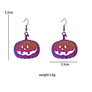 Macro detail of Halloween pumpkin earrings with rainbow plating and precise dimensions