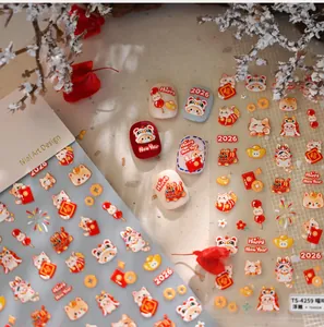 3D embossed nail art stickers featuring lucky cats, red envelopes, and 2026 New Year motifs