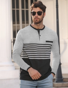 Detail of men's slim fit Henley shirt with contrast stripes and buttoned V-neckline
