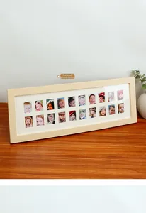 Macro detail of natural wood photo frame with 18 multi-slots for school year memories