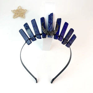 Detail of blue raw crystal stones and silver crescent moon on handmade crown headband