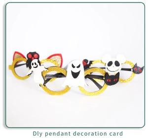 Detail of glitter Halloween glasses frames with pumpkin, skull, and bat party motifs