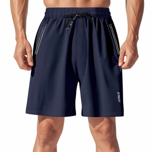 Detailed view of dark blue quick-dry shorts with elastic drawstring and zipper pockets