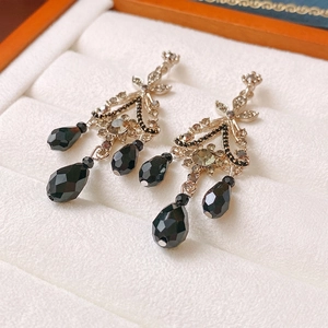 Elegant vintage style hollow branch earrings with black crystals and silver pins