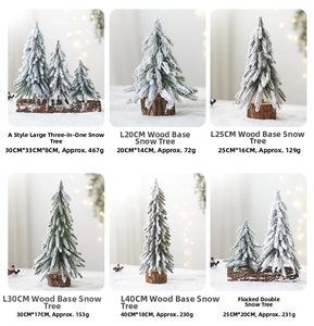 Mini flocked Christmas tree with snow effect and wooden base in various sizes