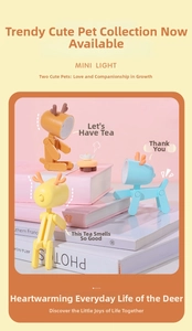 Mini deer-shaped LED night light with adjustable joints used as cute phone stand