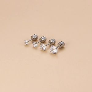 Set of four stainless steel stud earrings with round cubic zirconia in varied sizes