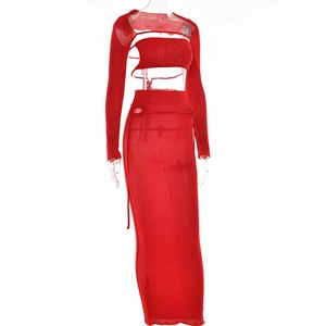 Detail view of the red mesh two-piece set featuring cutout long sleeves and side slit maxi skirt