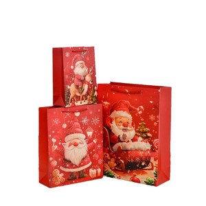 Three-piece set of red Santa Claus Christmas gift bags with handles in various sizes