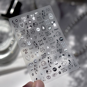 Detail of TO-5243 3D embossed nail art stickers with black cat and silver doodle designs