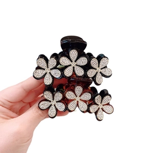Elegante pinza per capelli floreale con strass per acconciature sofisticate