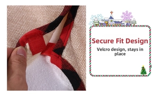 Detail of burlap Christmas tree skirt showing Velcro closure and red-black plaid border
