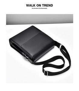 Detail of premium black PU leather shoulder bag with textured logo strap and silver buckle