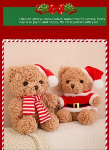 Detail of Christmas teddy bears with Santa hat, red scarf and plush brown fur texture