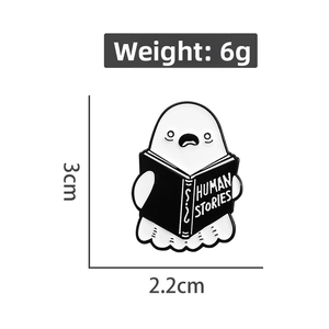 Detail shot of ghost enamel pin reading Human Stories with 3cm height dimensions