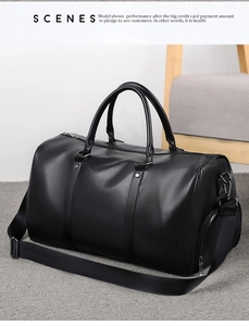 Close-up of black lychee-textured leather fitness bag with dual handles and metal hardware