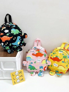 Cute cartoon dinosaur backpacks for kids in black, pink, and yellow colors